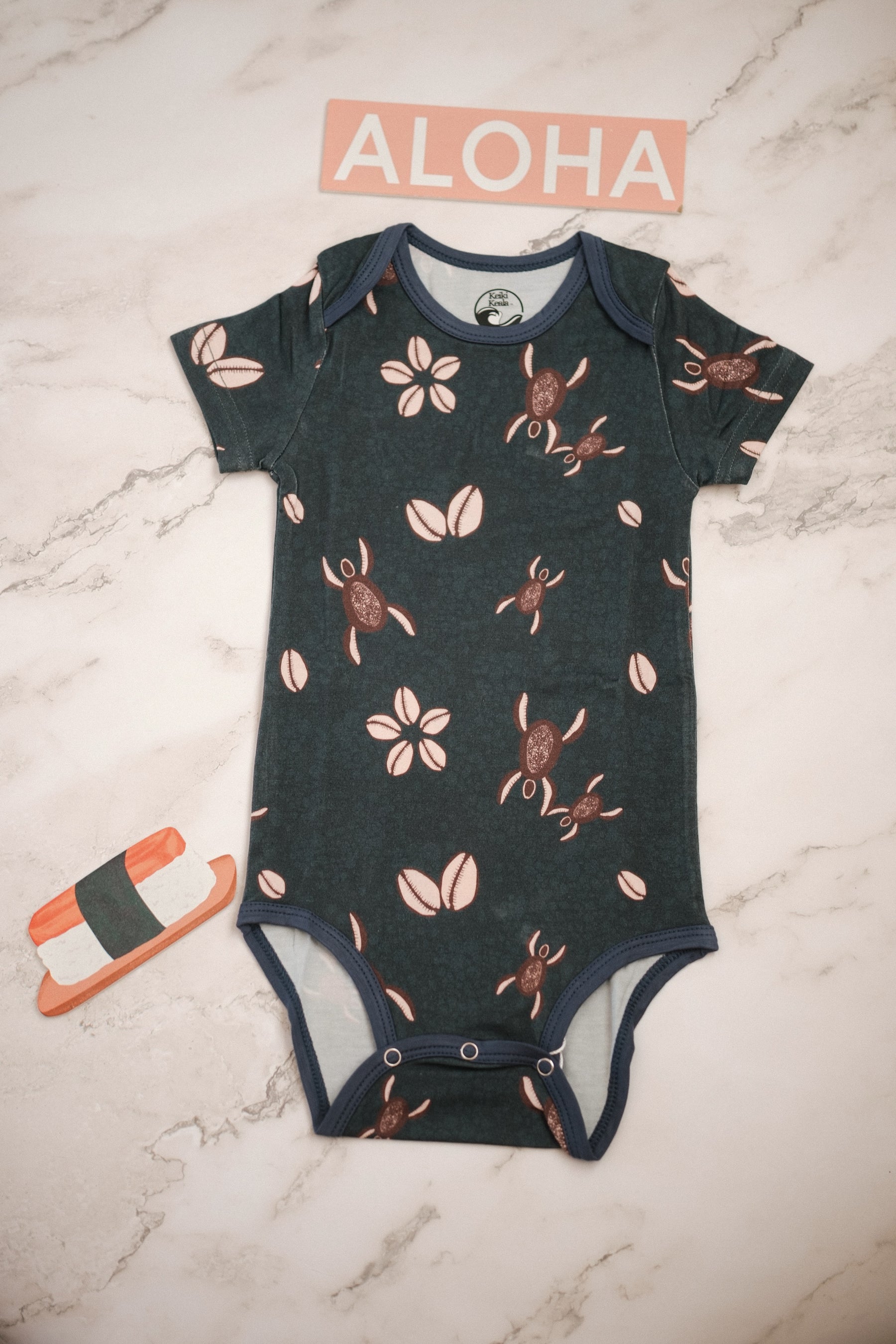Blue Honu Cowrie onesie