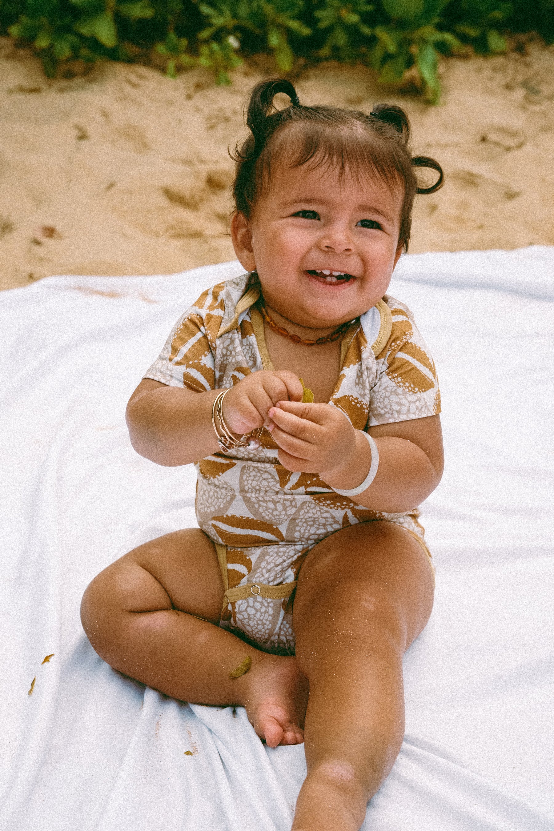 Cowrie onesie