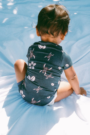 Blue Honu Cowrie onesie